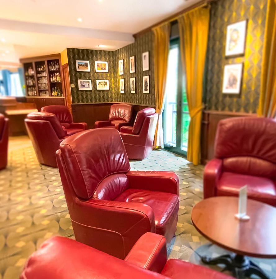 Logis Hotel - Restaurant Le Tulipier Vienne-le-Château Eksteriør billede